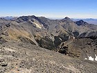 Summit view southeast of USGS Peak, Mount McCaleb, and Little Mac.