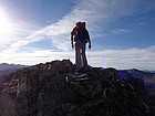 John reaching the summit of Simpson Peak.