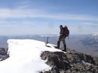 John on the summit of Mount McCaleb.
