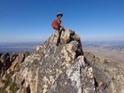 John perched on the airy summit of Merritt Peak.