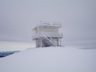 The frozen lookout building.