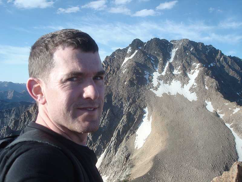 Dave on the summit of Merriam Peak, Castle Peak in the background. - DSC02913