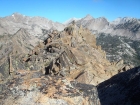 Summit cairn on Hatchet Peak, with four White Cloud 11ers visible in the background.